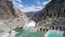 世界首座300米級(jí)低熱水泥混凝土特高拱壩全線貫通！